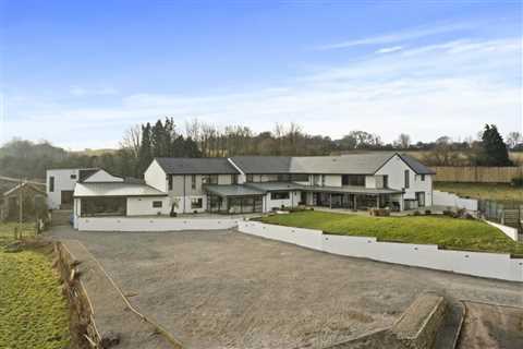 £3.5m mansion with football pitch hits market - but there's a motorway in your backyard